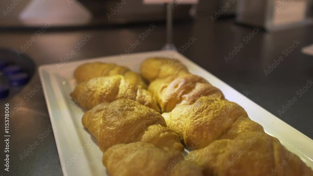 French croissants serving on plate French croissants serving on plate