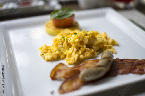 Scrambled egg on white plate.