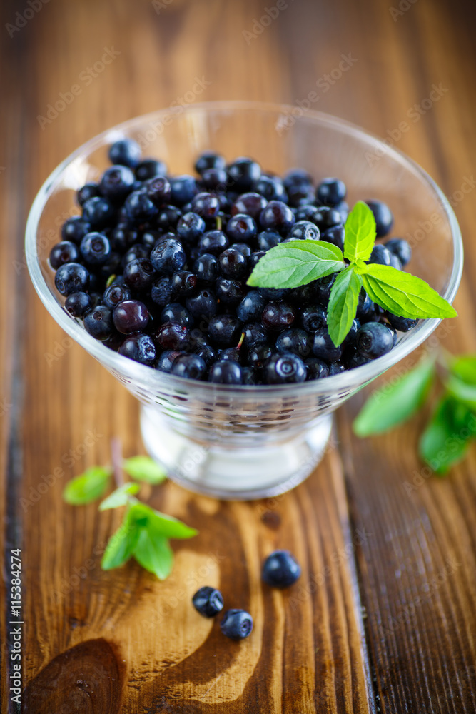 sweet ripe blueberries in a glass sweet ripe blueberries in a glass