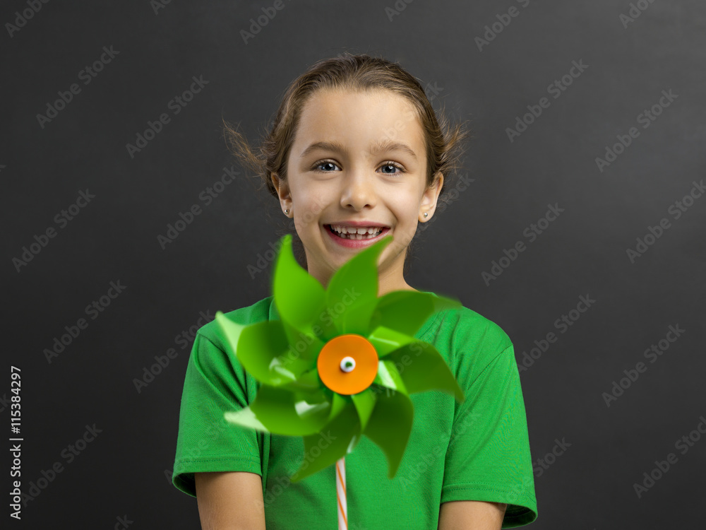 Little girl holding a windmill Little girl holding a windmill