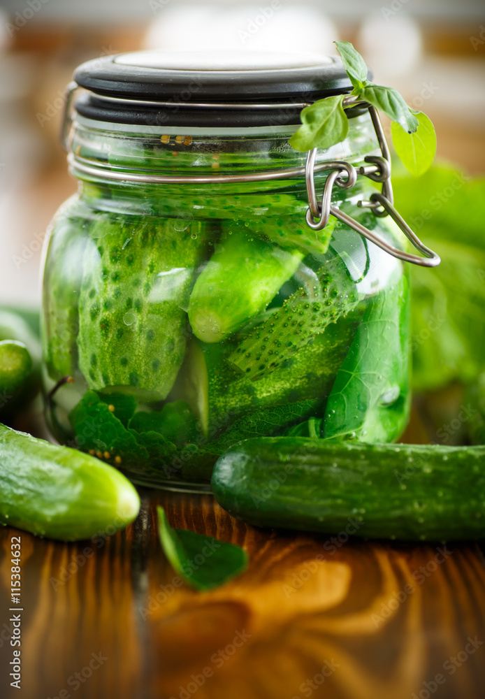 pickled cucumbers with spices in glass jar pickled cucumbers with spices in glass jar