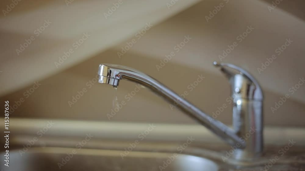 Tap with water drops. Economy And Saving Concept. Close up Tap with water drops. Economy And Saving Concept. Close up