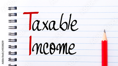 TI Taxable Income written on notebook page photo
