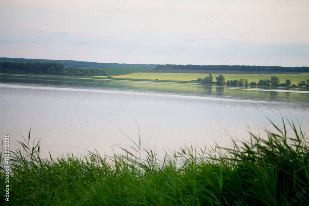 Sunset scene on the river, selective focus. The Volga region, Vo