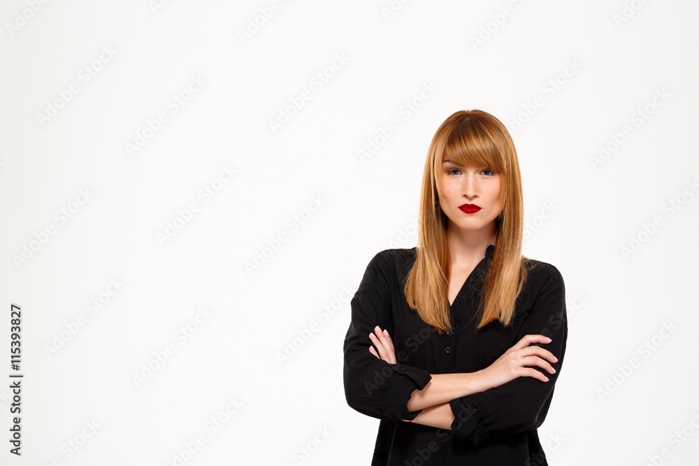 Portrait of successful businesswoman standing over white background. Copy space. Portrait of successful businesswoman standing over white background. Copy space.