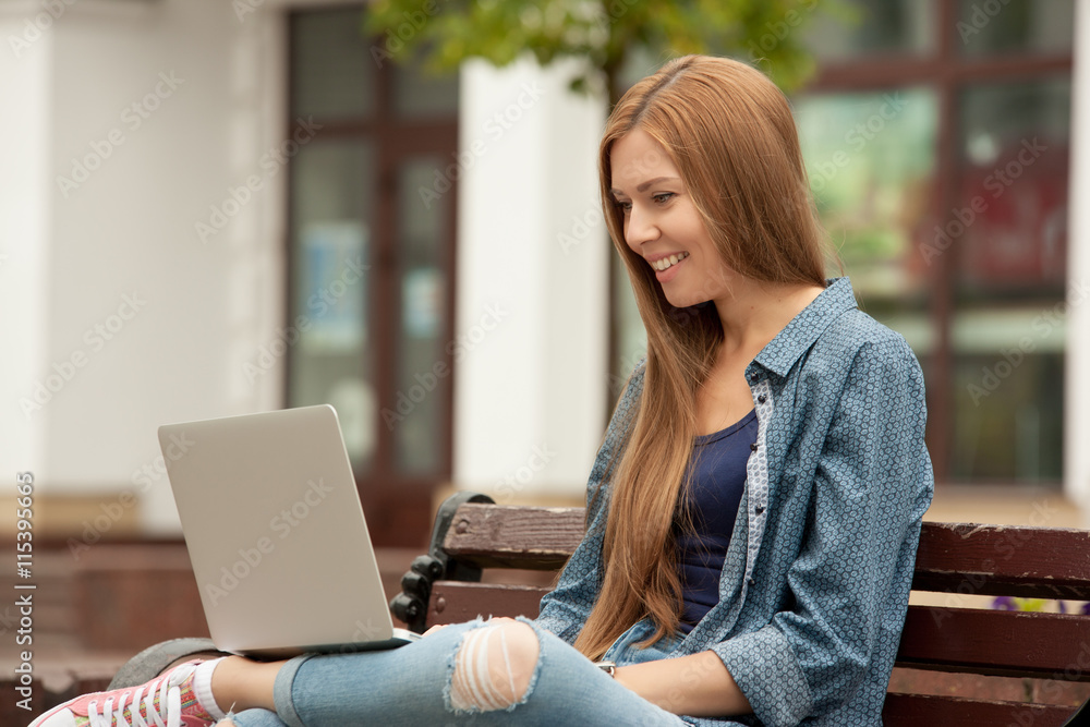 Young stylish woman with a laptop. Young stylish woman with a laptop.