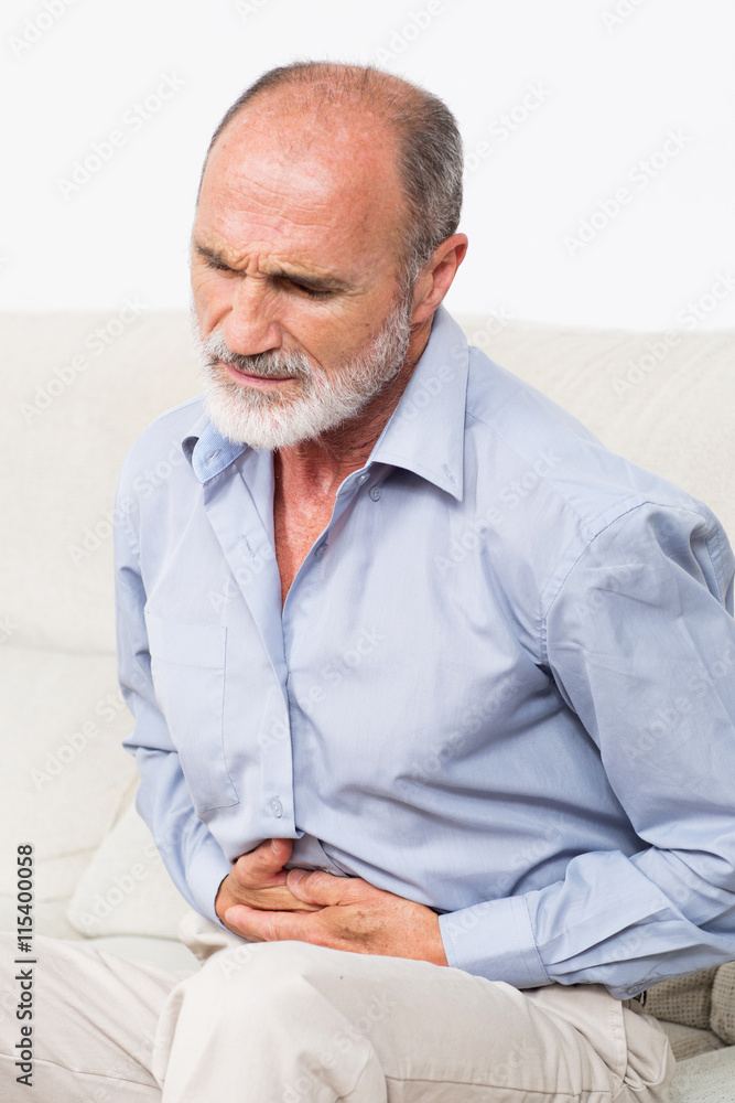 Fototapeta premium Elderly man with stomachache