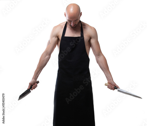 Naked chef in apron holding japanese knife photo