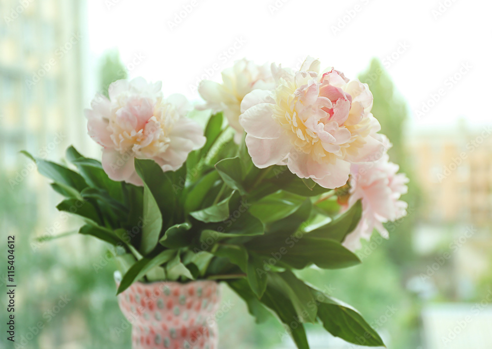 Peony bouquet on blurred background