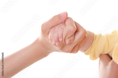 Mother and baby's hands isolated on white © Africa Studio