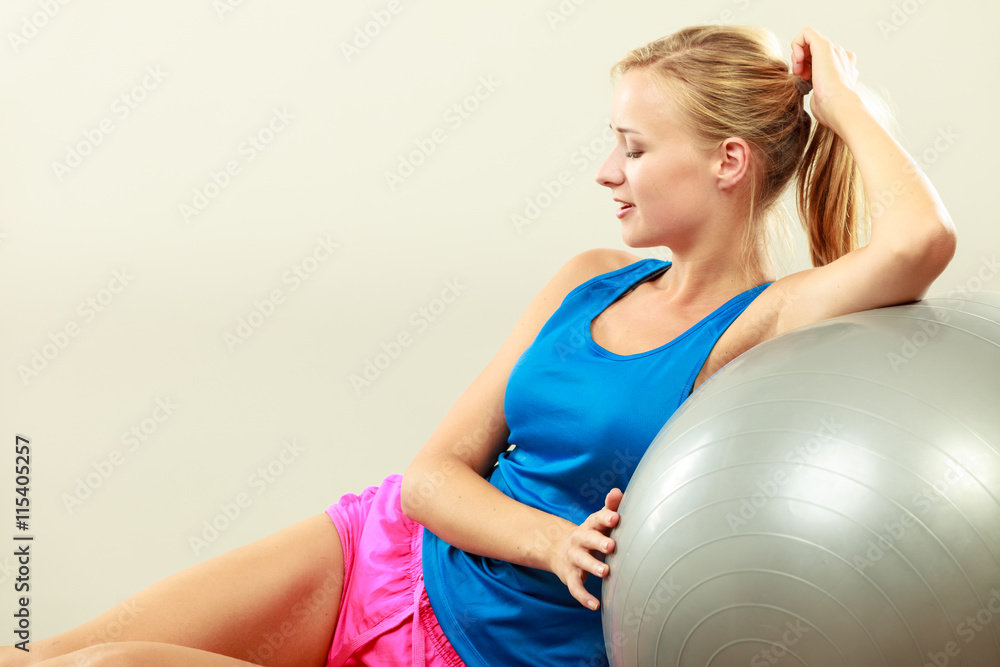 woman doing fitness exercises with fit ball woman doing fitness exercises with fit ball
