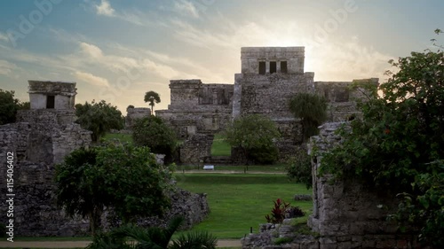 beautiful sunrise over tulum mayan ruins temple