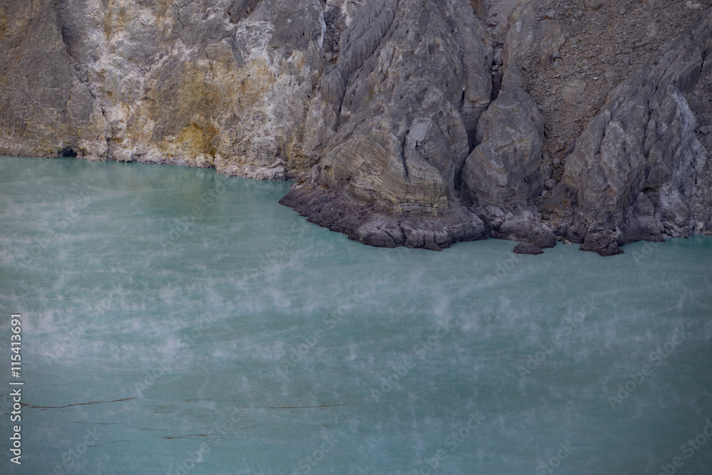 The acid sulphur lake at Kawah Ijen crater. Indonesia The acid sulphur lake at Kawah Ijen crater. Indonesia