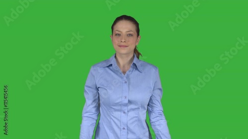 Female business person with flirtatious look (Greren Key) photo