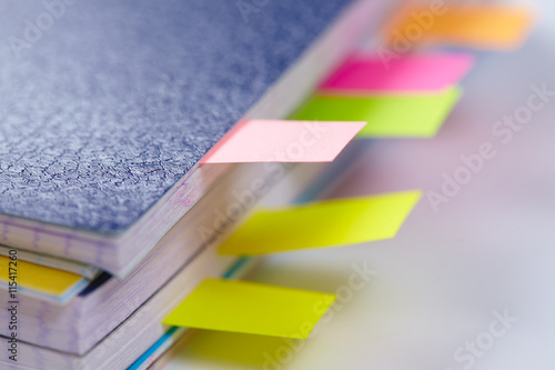 Business diary with a colored tabs photo