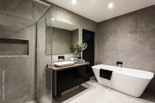 Photographie Modern bathroom with a shower area and bathtub