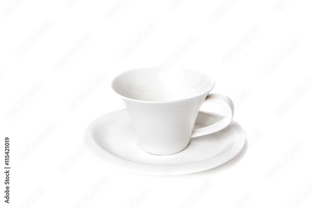 Closeup of an empty cup of coffee and a plate Closeup of an empty cup of coffee and a plate