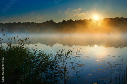 Fototapeta Naklejka Na Ścianę i Meble -  Sunrise over  Sawinda Wielka Lake. Masuria. Poland.