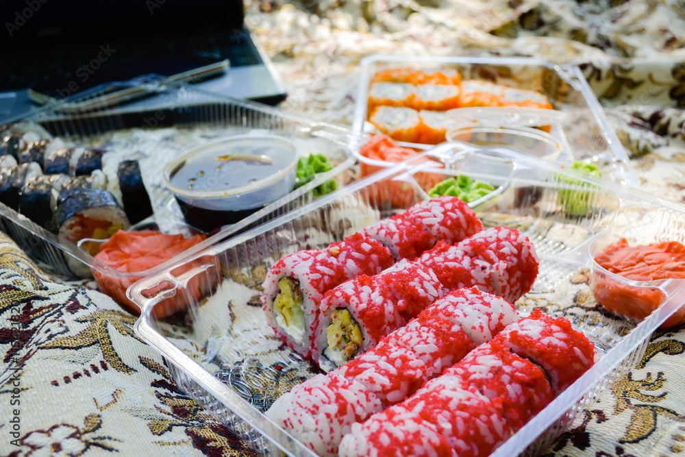 Picnic. Sushi outdoors on a summer day. Day off in the park