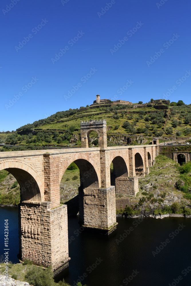 Roman bridge over the Tajo river in Valencia de Alcantara, Extremadura, Spain.(In the top view of the town of Valencia de Alcantara)