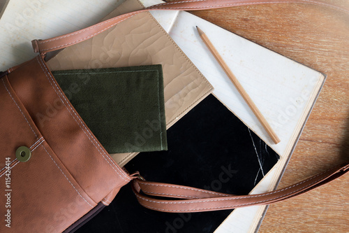 Old Brown Shoulder bag with pocket book , old diary book , old notebook ,and pencil 