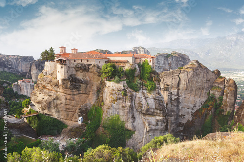 The Sacred Monastery of Varlaam, Meteora. Scenics view of the Orthodox Varlaam Monastery, bridge and a typical cable car in Meteora, Greece