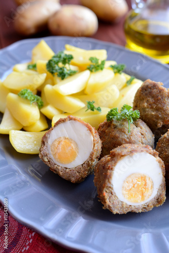 Scotch eggs with boiled potatoes