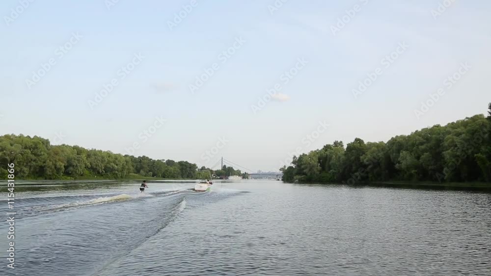 Water skiing on the city river. Water skiing on the city river.