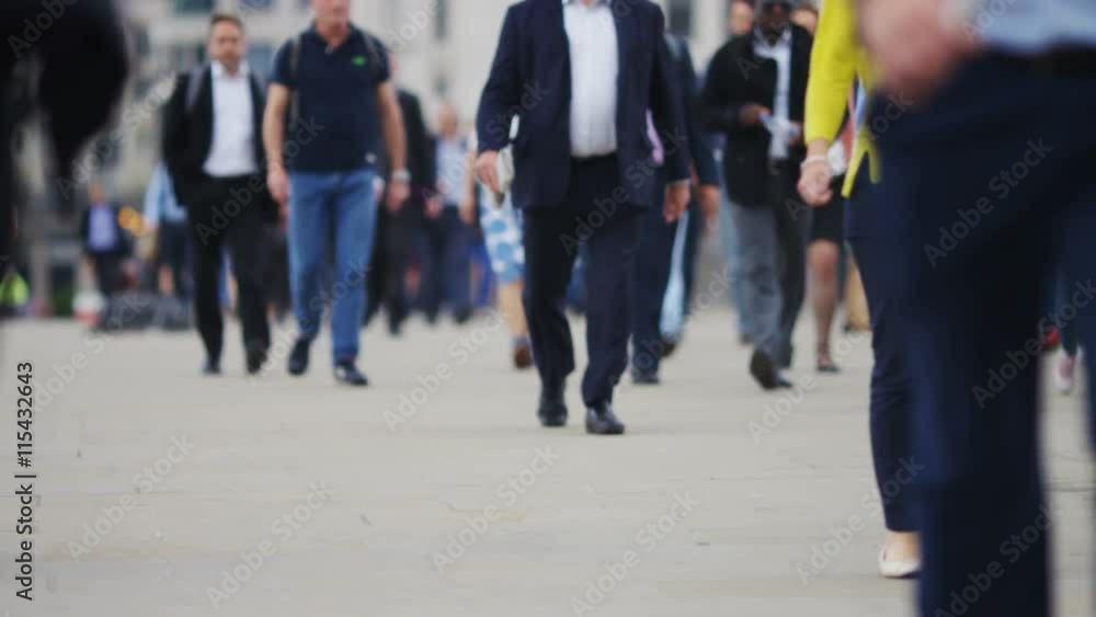 4K Anonymous pedestrians walking on a a pavement, in slow motion 4K Anonymous pedestrians walking on a a pavement, in slow motion