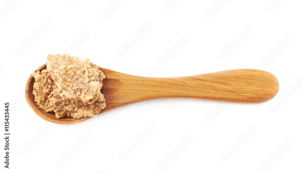 Wooden spoon full of cereal flakes isolated Wooden spoon full of cereal flakes isolated