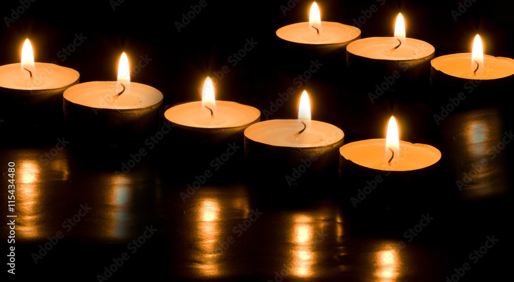 burning candles black background burning candles black background