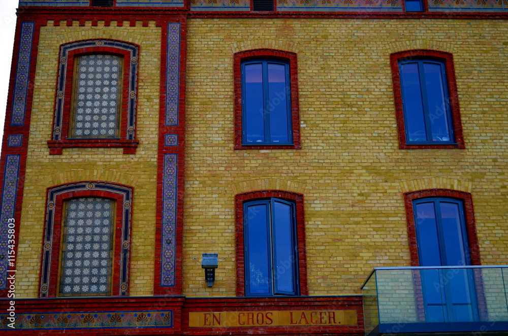 Fototapeta premium colorful brick facade of old house