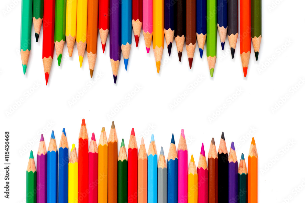 Row of color pencil placed on white background Row of color pencil placed on white background