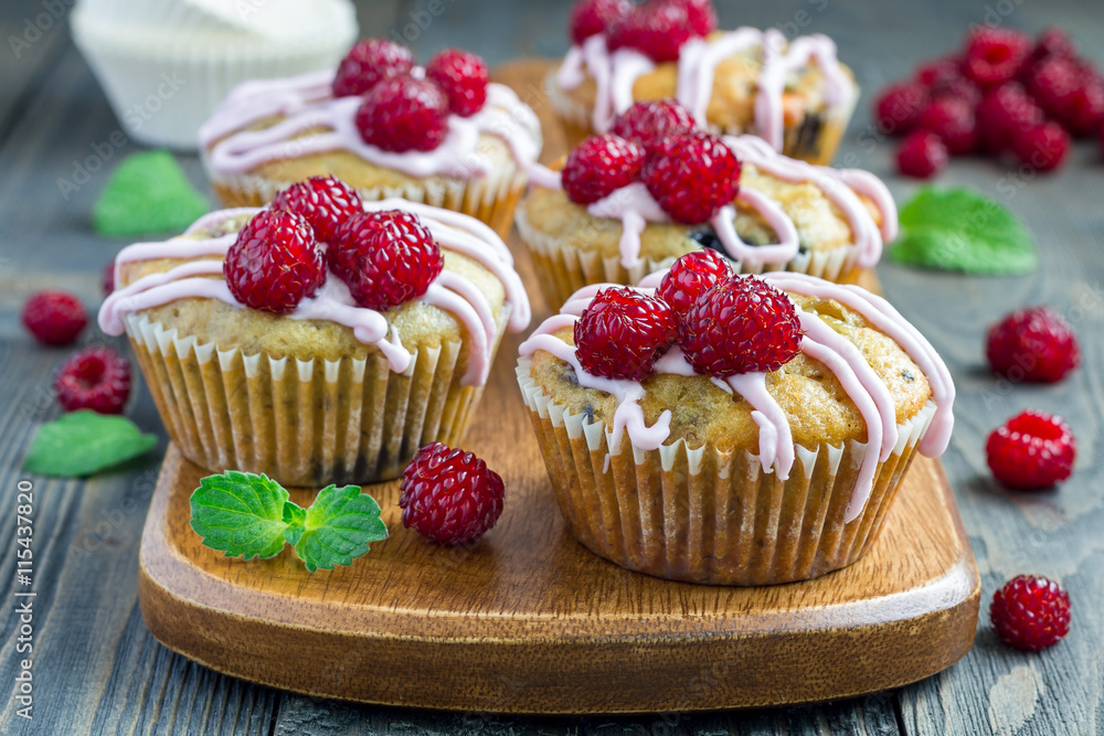 Banana bread muffins with raspberries, cherries and white chocolate, horizontal