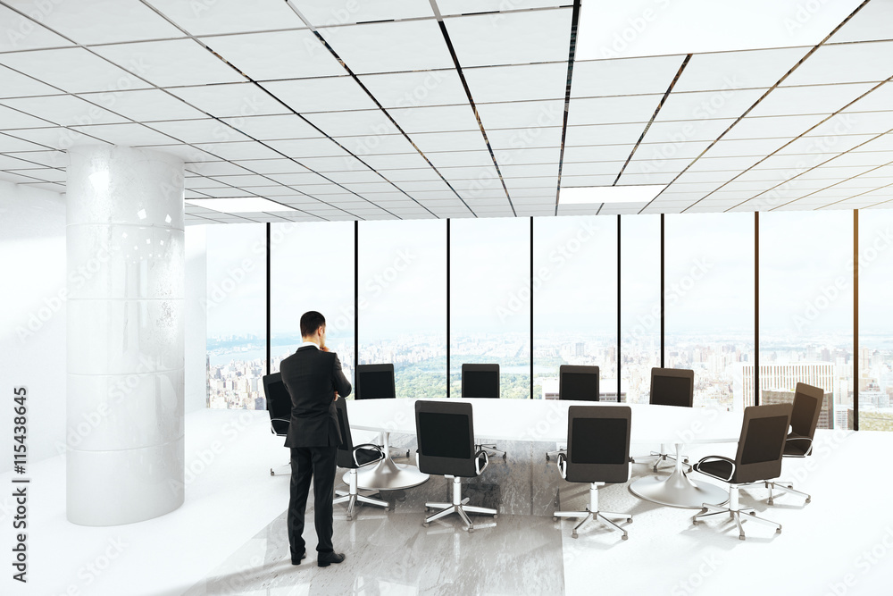 Pensive man in conference room Pensive man in conference room