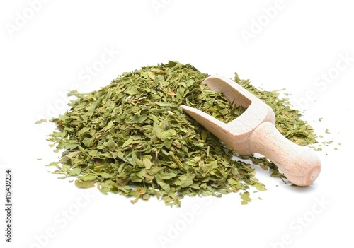 Dried lovage isolated on white background