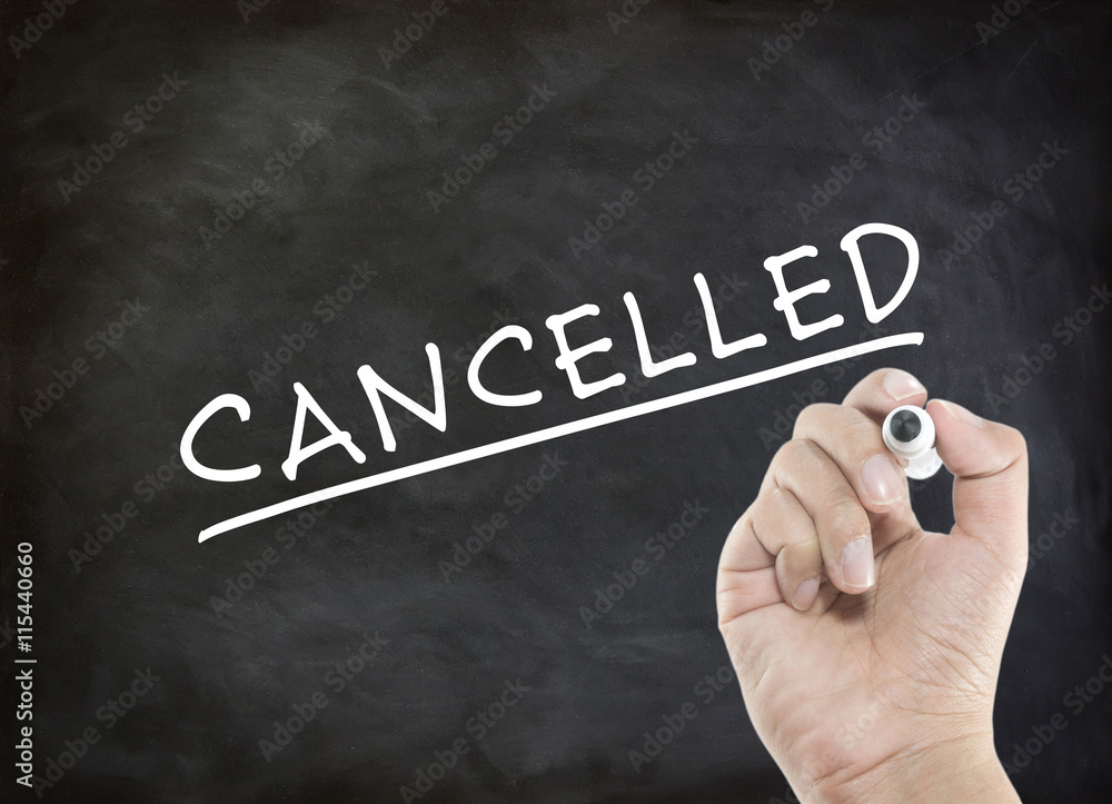 Fototapeta premium CANCELLED - business concept with hand writing