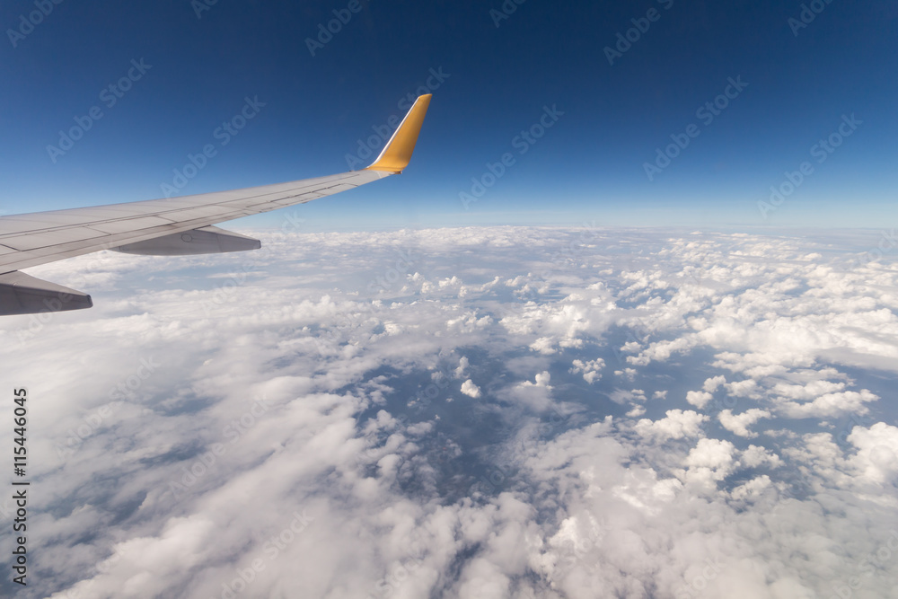 View from a window seat in cabin of the aircraft. View from a window seat in cabin of the aircraft.
