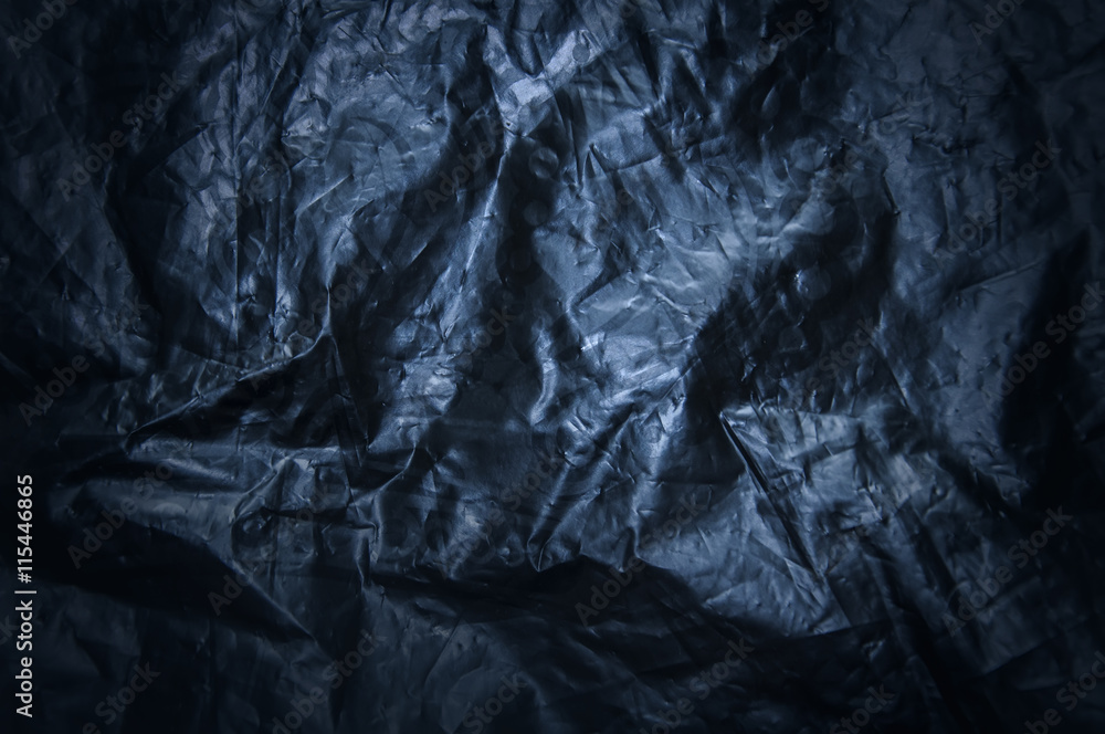 Black crumpled texture background Black crumpled texture background
