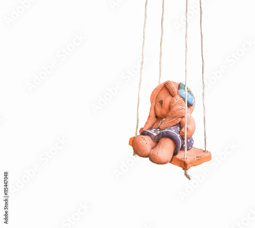 Mobile Girl doll or hanging Doll,made of pottery, isolated.