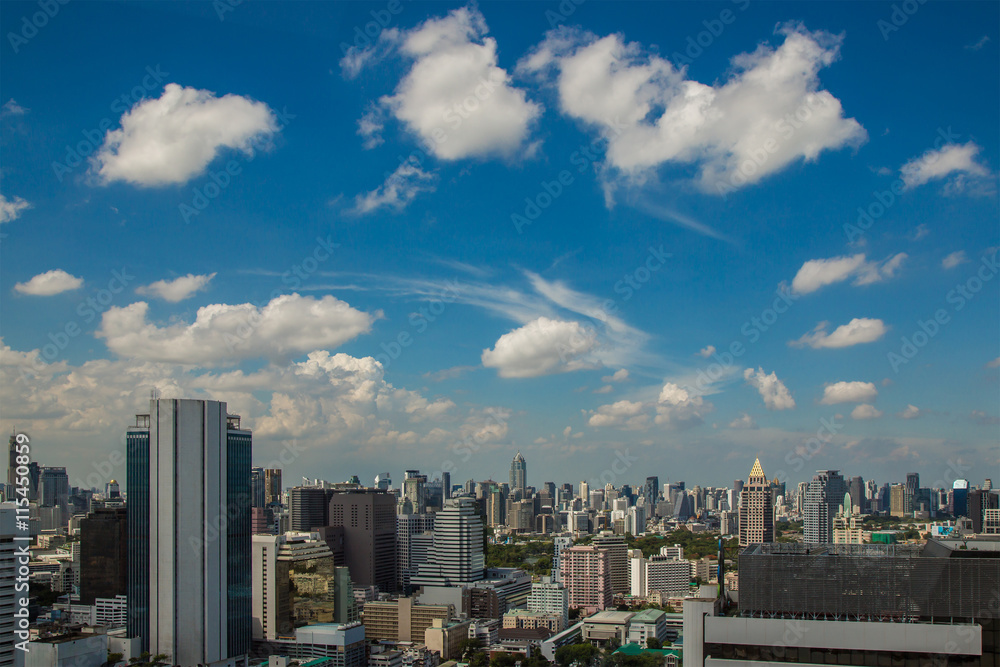 Cityscape and urban under blue sky at daytime.
