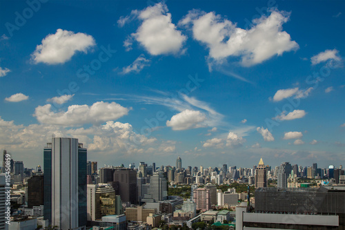 Cityscape and urban under blue sky at daytime.