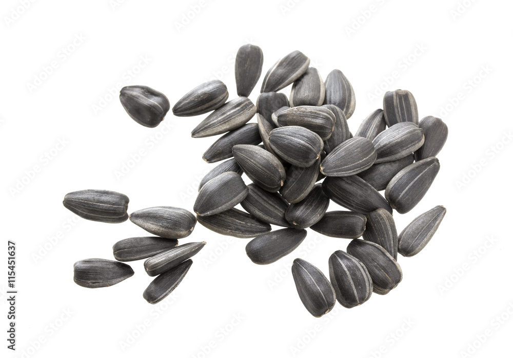 Pile of sunflower seeds isolated on white Pile of sunflower seeds isolated on white