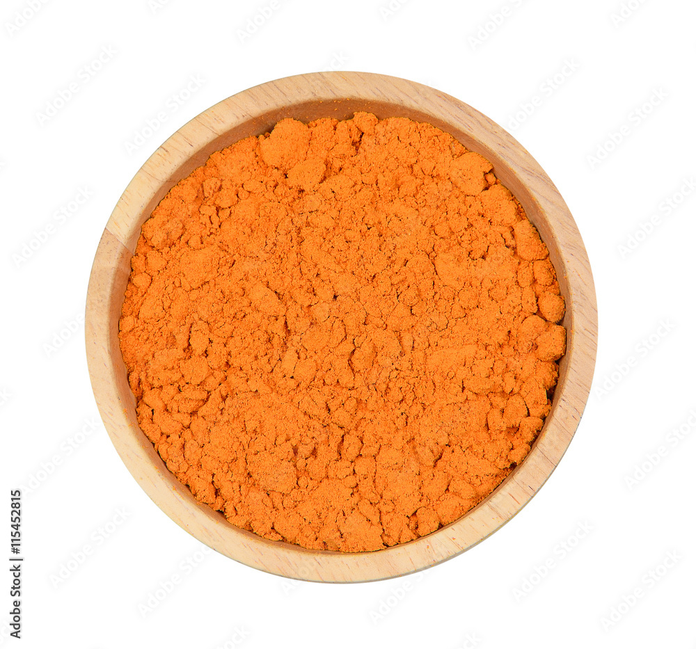 Top view turmeric powder in wood bowl on white background Top view turmeric powder in wood bowl on white background