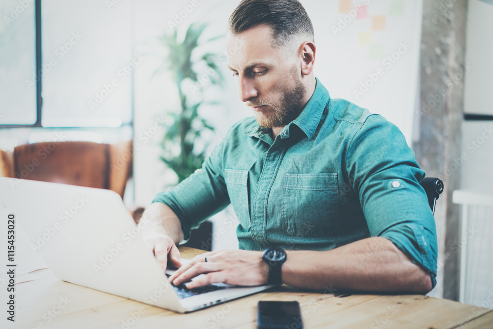 Fototapeta premium Social Trading Online Markets Analyze Reports.Men working wood table Modern Interior Design Meeting Room.Businessman Work Coworking Studio.Using Digital Tablet.Blurred Background Business Startup.