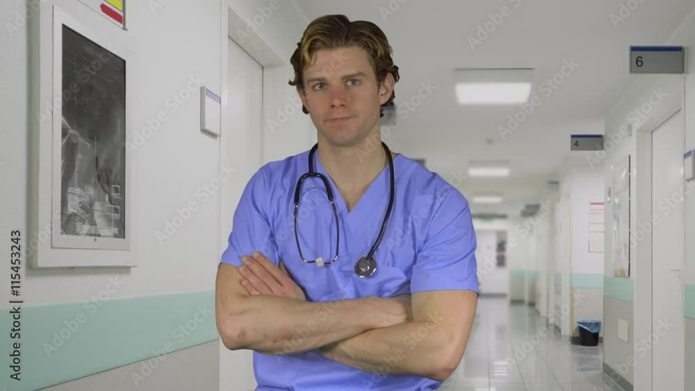 Expressionless male medical worker in a hospital Expressionless male medical worker in a hospital
