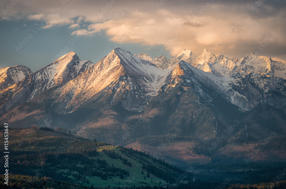 Fototapeta premium Cloudy Tatra mountains in the morning, covered with snow
