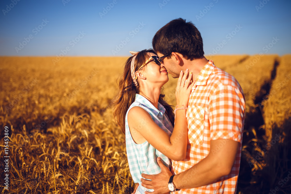 Couple in love enjoying tender moments during sunset . Emotional concept of relationship with travel boyfriend and girlfriends relaxing together. guys are walking in wheat
Couple in love enjoying tender moments during sunset . Emotional concept of relationship with travel boyfriend and girlfriends relaxing together. guys are walking in wheat