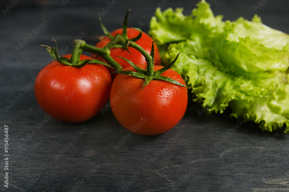Tomatoes with salad close up Tomatoes with salad close up