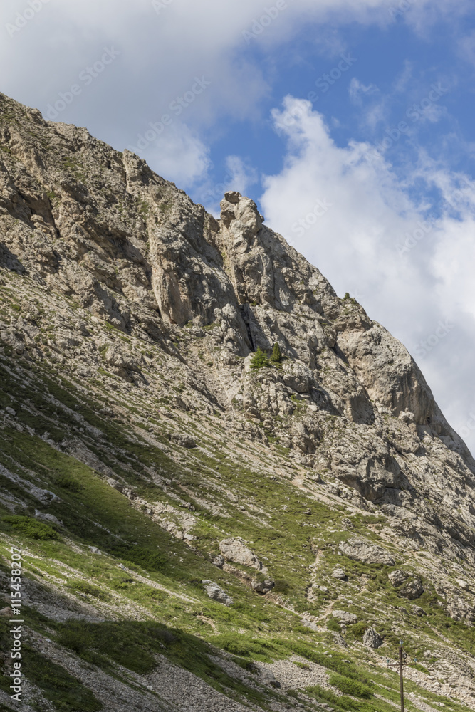 Fototapeta premium rocky mountain and cloudy sky